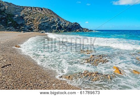 Rocks, Pebbles And Waves