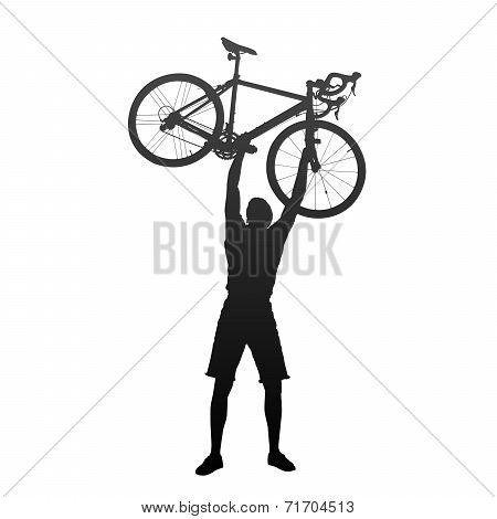 Silhouette of man with hands on racing bicycles