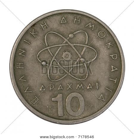 Modelo científico del átomo en la vieja moneda griega
