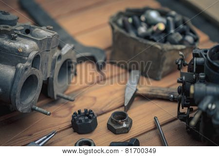 Carburetors for a car engine with tools