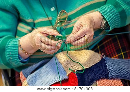 Grandmother Knits Up The Wool