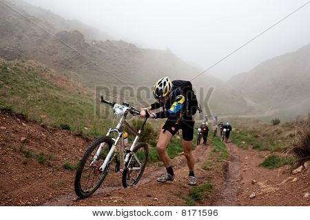 Hard Bike Competition In Mountains
