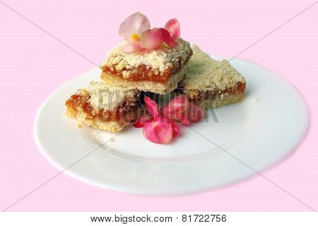 Sweet cakes with pink flowers