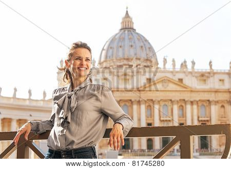 Portrait Of Happy Young Woman In Front Of Basilica Di San Pietro In Vatican City State