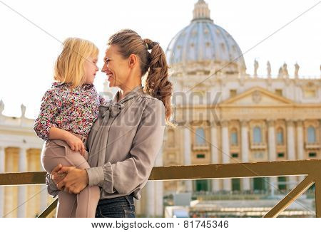 Portrait Of Happy Mother And Baby Girl On Piazza San Pietro In V