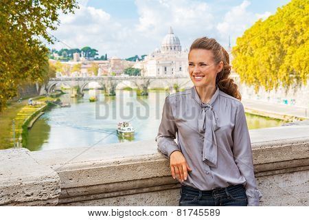 Portrait Of Happy Young Woman On Bridge With View On Basilica Di