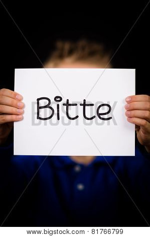 Child Holding Sign With German Word Bitte - Please