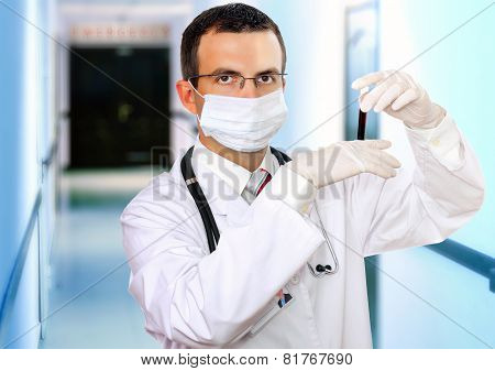 Doctor  Resarch A Medical Test Glass With Blood.