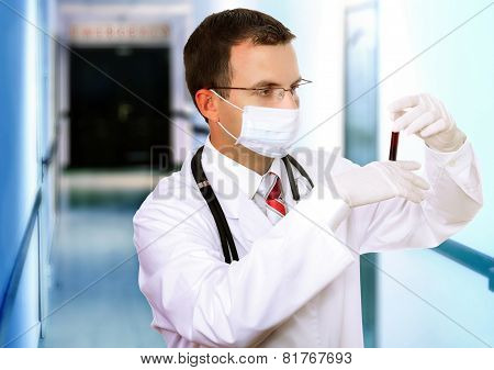 Doctor  Resarch A Medical Test Glass With Blood.