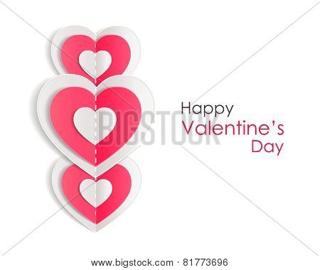 Valentines day background with paper hearts isolated on white background.