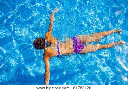 Girl in the pool