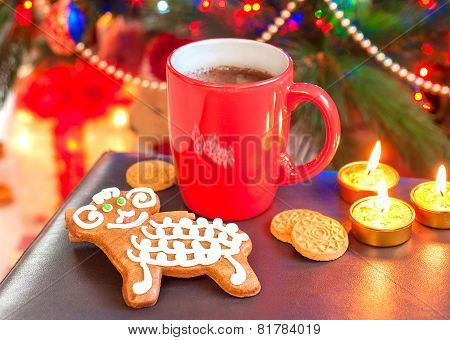 Sheep Shape Gingerbread With Cup Of Coffee On Christmas Background.