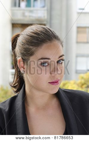 Pretty Young Woman On The Balcony