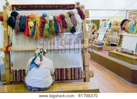 The Woman Behind Work - Weaving A Carpet Of Silk