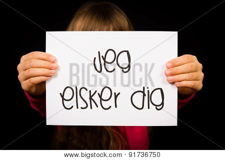 Child Holding Sign With Danish Words Jeg Elsker Dig - I Love You