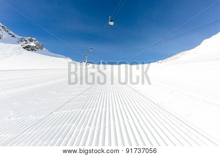 Newly Groomed Ski Slope On A Sunny Day