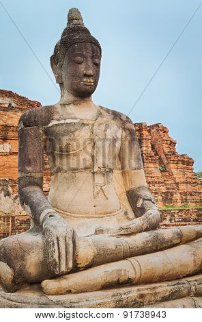 Buddha statue in Wat Mahathat. Ayutthaya historical park. Panorama
