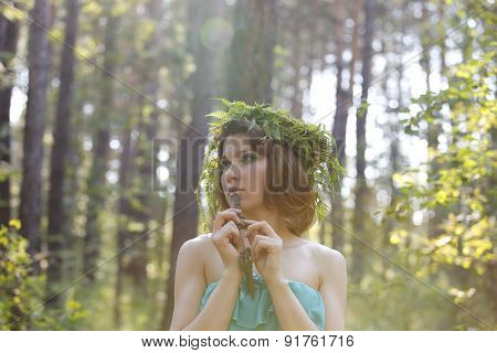 Beautiful Model In A Forest With A Vintage Key