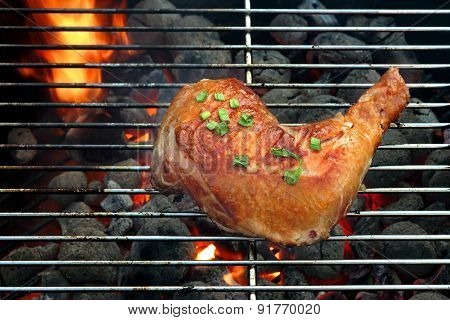 Grilled Chicken Quarter On The Hot Bbq Grill Close-up.