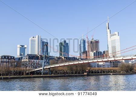 Holbein Bridge In Frankfurt Am Main With Skyline.