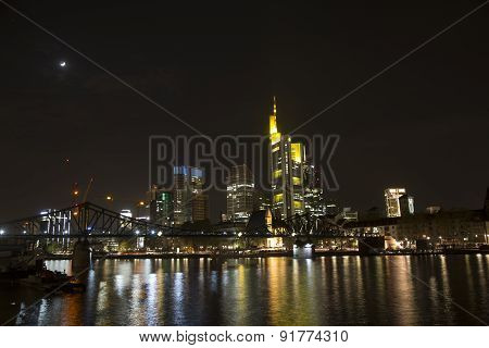 Illuminated  Buildings And Skyline At Night In Frankfurt