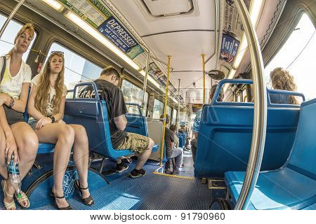 People In The Downtown Metro Bus In Miami, Usa