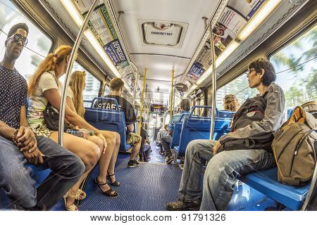 People In The Downtown Metro Bus In Miami, Usa