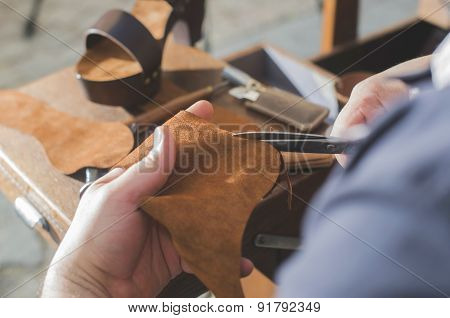 Hands Making Shoes