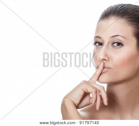Expressive Woman Holdinh Her Finger On Lips, Isolated On White Background - Studio Shot. Female Or G