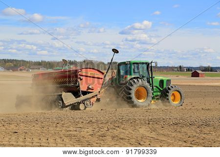 John Deere 6620 Agricultural Tractor And Vm Direct Seed Drill On Field At Spring