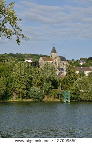 Triel sur Seine France - august 9 2015 : the picturesque city view from the left side of Seine river in summer