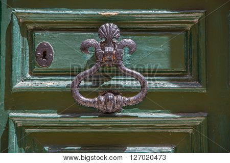 A wood door with lock and knob
