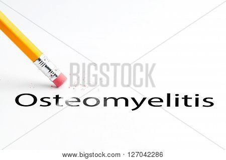 Closeup of pencil eraser and black osteomyelitis text. Osteomyelitis. Pencil with eraser.