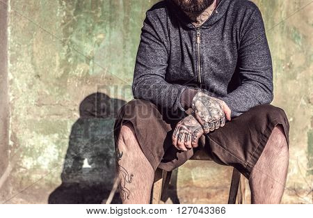 Man With Tattooes On His Hands