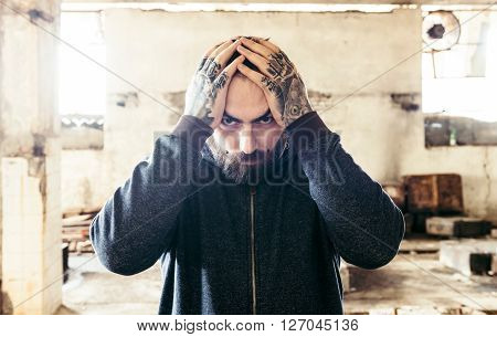 Man With Hands On Head