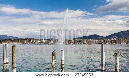 GENEVA, SWITZERLAND - APRIL 11, 2015: Exterior views of the buildings and fountain at the Geneva Lake on April 11 2015. Its the second most populous city in Switzerland (after Zurich).