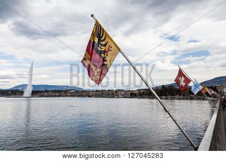 GENEVA, SWITZERLAND - APRIL 11, 2015: Exterior views of the buildings and fountain at the Geneva Lake on April 11 2015. Its the second most populous city in Switzerland (after Zurich).