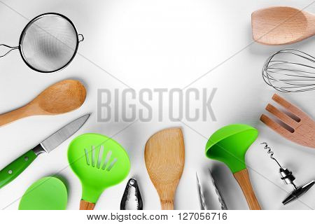 Set of stainless and wooden utensils, isolated on white