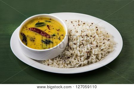 Whole Yellow Lentil with Rice, dal tadka and jeera rice, Indian Dish, cooked rice and cooked Arhar or Toor dal (Pigeon Pea)