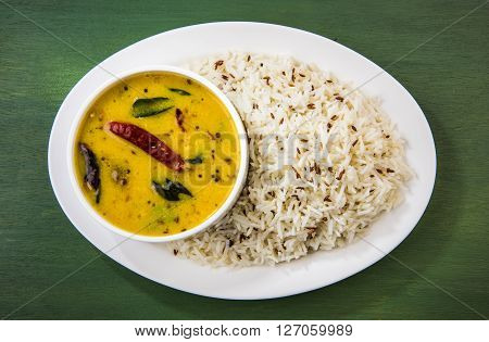 Whole Yellow Lentil with Rice, dal tadka and jeera rice, Indian Dish, cooked rice and cooked Arhar or Toor dal (Pigeon Pea)