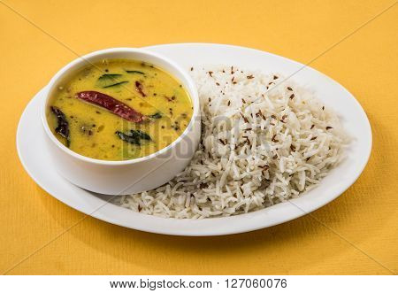 Whole Yellow Lentil with Rice, dal tadka and jeera rice, Indian Dish, cooked rice and cooked Arhar or Toor dal (Pigeon Pea)