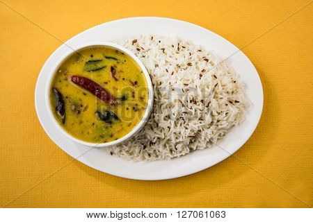Whole Yellow Lentil with Rice, dal tadka and jeera rice, Indian Dish, cooked rice and cooked Arhar or Toor dal (Pigeon Pea)