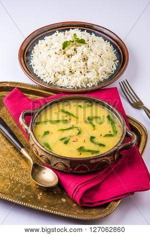 Whole Yellow Lentil with Rice, dal tadka and jeera rice, Indian Dish, cooked rice and cooked Arhar or Toor dal (Pigeon Pea)