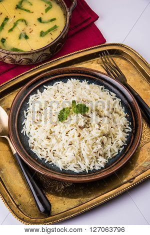 Whole Yellow Lentil with Rice, dal tadka and jeera rice, Indian Dish, cooked rice and cooked Arhar or Toor dal (Pigeon Pea)