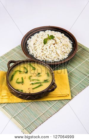 Whole Yellow Lentil with Rice, dal tadka and jeera rice, Indian Dish, cooked rice and cooked Arhar or Toor dal (Pigeon Pea)