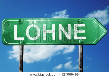 Lohne road sign, on a blue sky background