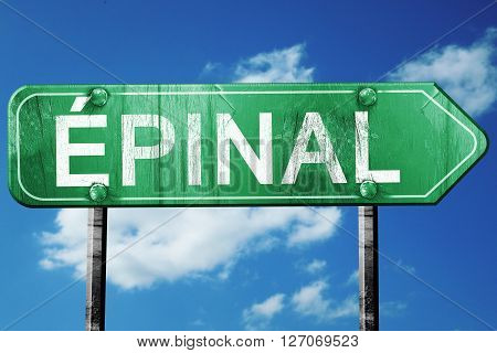 Epinal road sign, on a blue sky background