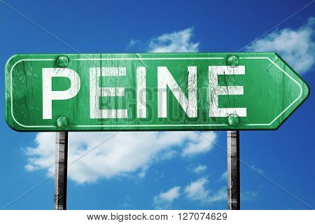 Peine road sign, on a blue sky background