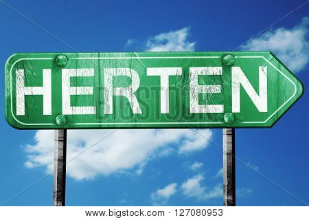 Herten road sign, on a blue sky background