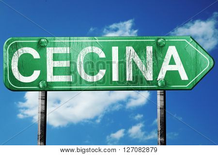 Cecina road sign, on a blue sky background